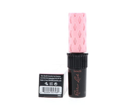 Benefit Roller Lash curved brush at work on lashes for lift.