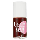 Benefit Benetint travel-size rose tint on cheeks for a natural, long-lasting glow.