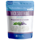 Better Bath Better Body back-soothing-bath-salt-32oz bottle closeup illustrates a calming soak.