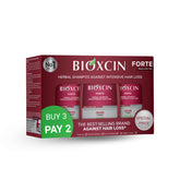 BIOXCIN herbal shampoo bottle closeup highlights nourishing formula for stronger hair.
