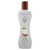 BioSilk Silk Therapy coconut oil bottle highlights frizz control for smooth, shiny hair.