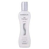 BioSilk Silk Therapy Original bottle showing weightless shine for all hair types.