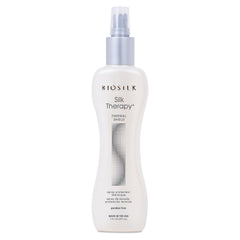 BioSilk Silk Therapy Thermal Shield spray bottle demonstrates heat protection for smooth styling.
