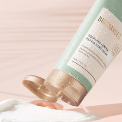 BIOSSANCE hand cream bottle closeup highlighting rich, non-greasy hydration.