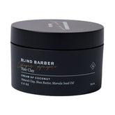 Blind Barber Bryce Harper Hair Clay bottle closeup showing matte finish for natural-looking hold.