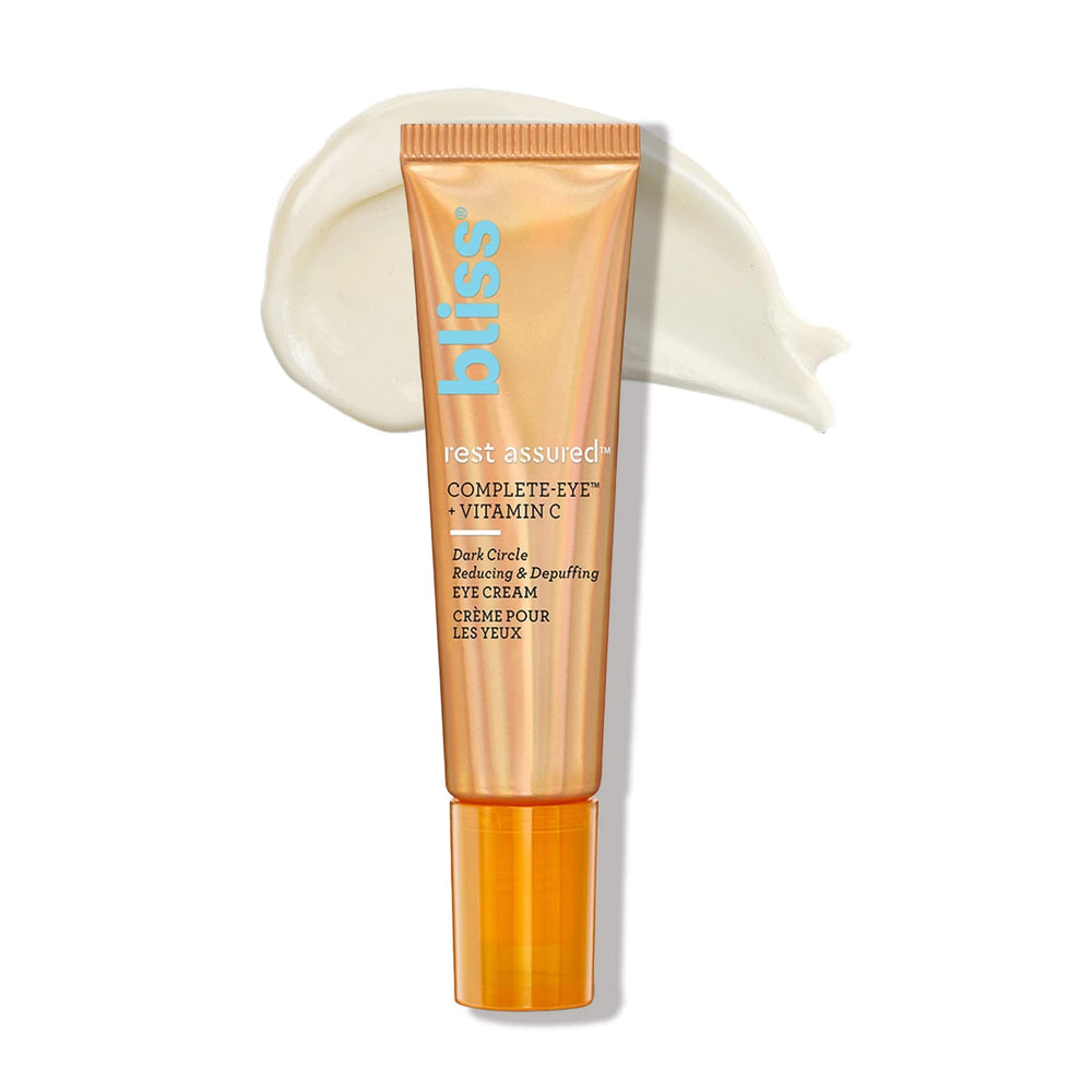 Bliss Rest Assured Eye Cream tube close-up shows lightweight, non-greasy formula for daily use.