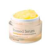 BLITHE Pressed Serum Gold Apricot bottle close-up highlights glow-boosting Niacinamide.