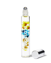 Blossom Vanilla Orchid roll-on bottle shows real flower infusion for subtle daily fragrance