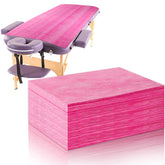 Boao disposable bed sheets unfolded on pink spa table for clean coverage.