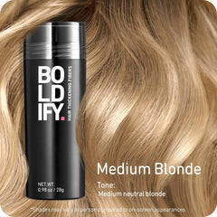 Boldify Hair Fibers close-up reveals mineral colorants blending with hair.