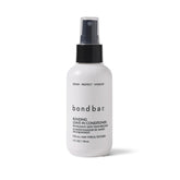 Bondbar Bonding Leave-In Conditioner bottle on surface for moisture-ready hair