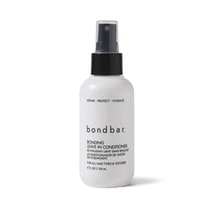 Bondbar Bonding Leave-In Conditioner bottle on surface for moisture-ready hair