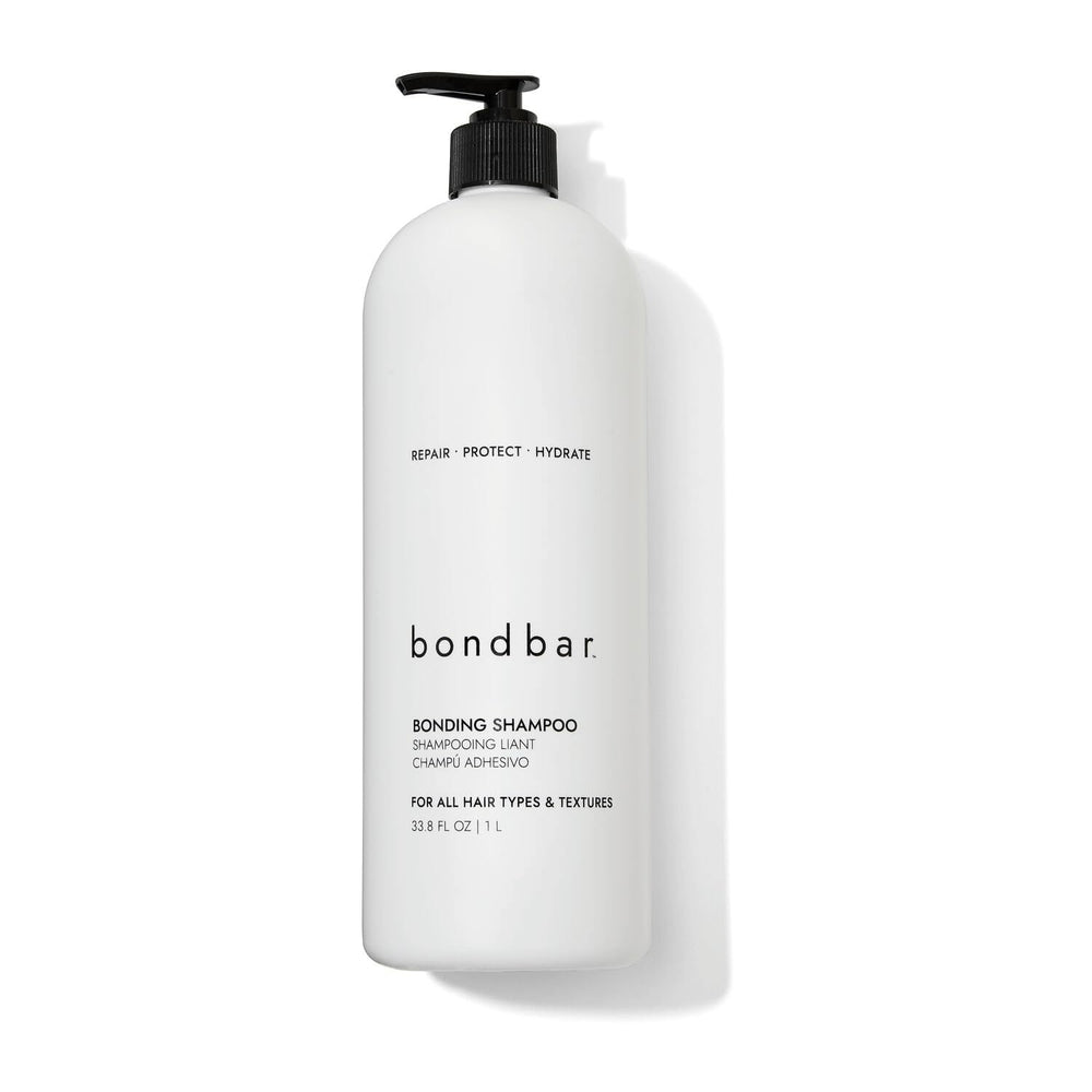 Bondbar Repairing Shampoo bottle front highlights vegan, cruelty-free care for all hair types.