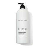 Bondbar Repairing Shampoo bottle front highlights vegan, cruelty-free care for all hair types.
