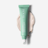 BOOM! by Cindy Joseph Boom Awaken under-eye cream tube close-up showing cooling formula for refreshed eyes.
