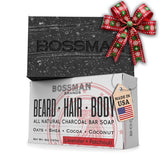 Bossman 4-in-1 charcoal soap bar close-up highlighting compact grooming bar for beard, hair, skin.