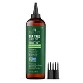 Botanic Hearth tea tree oil bottle close-up for soothing scalp