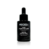 Brickell Men's anti-aging serum bottle closeup for nighttime skin nourishment.