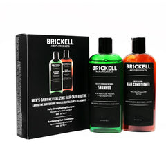 Brickell Men's Daily Revitalizing Shampoo bottle with mint refreshes the scalp.