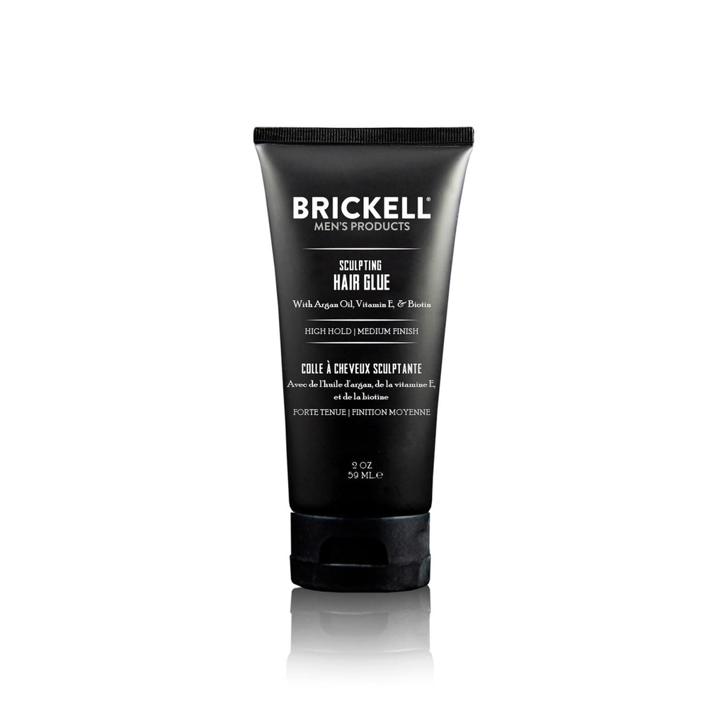 Brickell Men's Hair Glue bottle shows all-day hold for sculpted style.