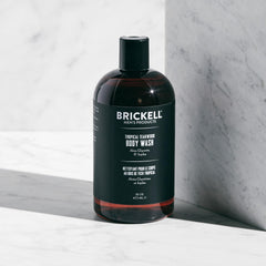 Brickell Men's Invigorating Body Wash lather shot demonstrates deep-cleaning foam.