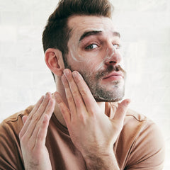 Brickell Men's Purifying Charcoal Face Wash ingredients close-up with charcoal and olive oil for deep cleansing