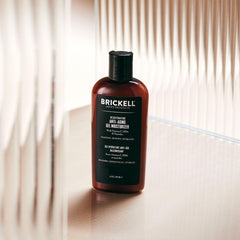 Brickell Men's Rejuvenating Gel Moisturizer texture on finger shows fast-absorbing gel