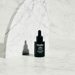 Brickell Men's Retinol Serum pump-top for controlled application.