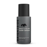 BRIGHTSIDE Salt & Clay Surf Spray bottle close-up showing texture-enhancing formula for beachy style.