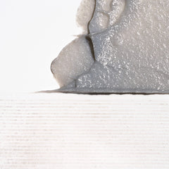 Briogeo Scalp Revival charcoal shampoo pour demonstrates easy distribution during a soothing wash