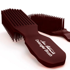 Brush With The Best maroon detangler brush closeup shows gentle flexi-bristles for knot-free detangling.