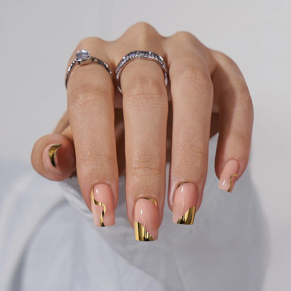 BTArtbox gold leaf nail closeup showing shiny finish and long wear