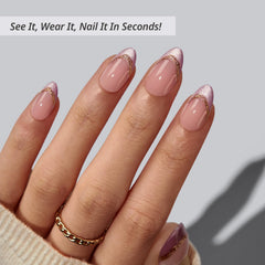 BTArtbox Pink Aurora nails on hand showing almond shape and 3D gold line detail for an elegant look.