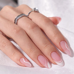 BTArtbox Press On Nails Medium with soft gel French tip closeup showing white swirl finish and natural look
