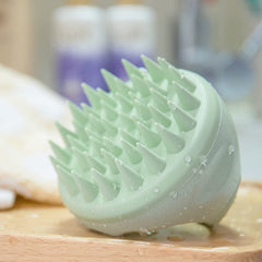 BTYMS massager in action delivering deep scalp massage and cleansing
