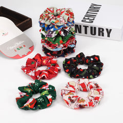 Budsmile Santa-pattern scrunchie adds festive flair and secure hold for events.