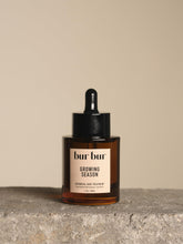 Bur Bur Growing Season Oil bottle ready for scalp nourishment and hair strength.