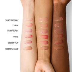 Buxom Full-On Glossy Lip Oil Trixie lip swatch highlights hydrated shine and subtle color.