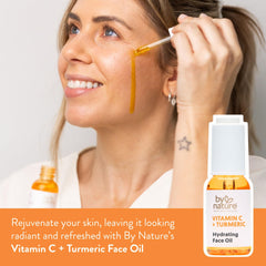 By Nature turmeric enriched face oil pour shows turmeric infusion for radiant texture