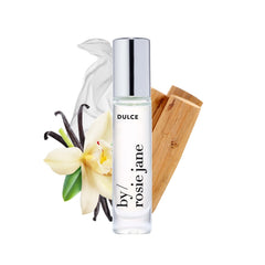 By Rosie Jane Dulce travel-size roll-on bottle for on-the-go fragrance.