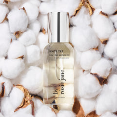 By Rosie Jane White Tee mist packaging closeup with clean-label branding.