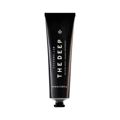 Caldera + Lab The Deep face-mask jar closeup highlights soothing clay texture for brighter, smoother skin.
