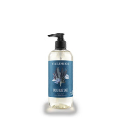 Caldrea Basil Blue Sage bottle-pump shows clean hands with soothing aroma.
