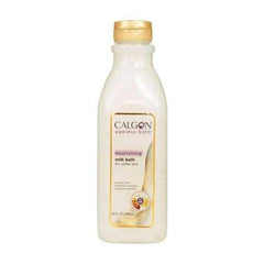 Calgon Ageless Bath bottle close-up highlights moisturizing serum beads for radiant skin