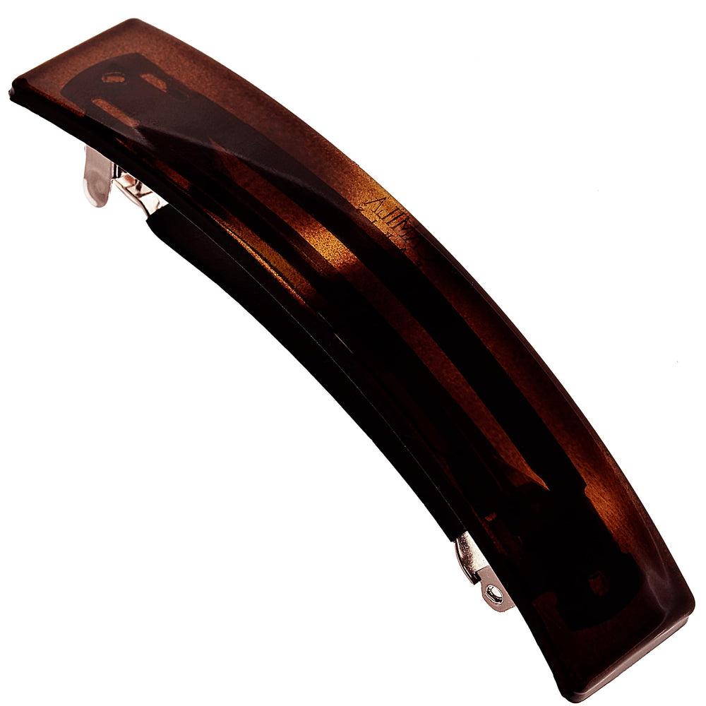 Camila Paris AD822 barrette close-up showing strong hold on tortoise shell