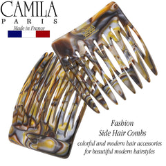 Camila Paris CP2332/2 in hand shows portable, lightweight hair accessory for daily wear