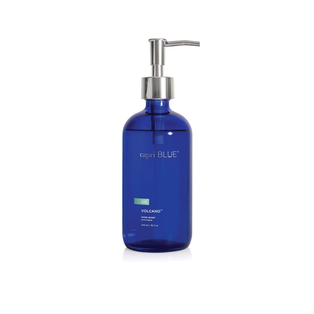 Capri Blue Volcano hand wash bottle on sink, adding style and light fruity scent.