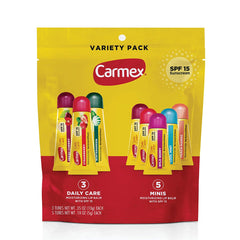 Carmex Daily Care tube close-up applying SPF lip protection for sun exposure.