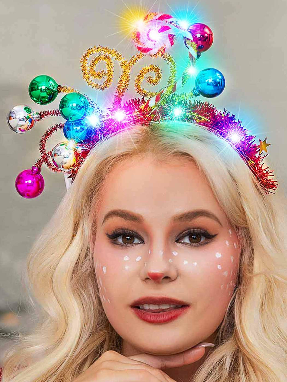 Catery light-up Christmas headband front view with festive sparkle for photos.