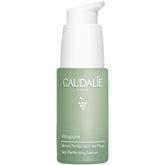 Caudalie Vinopure serum bottle with pump ready for pore-minimizing application.